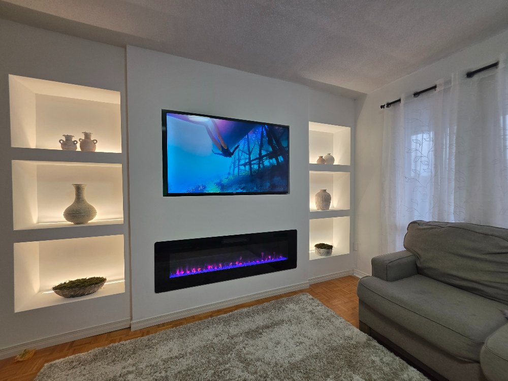 After a media wall with 60" fireplace was install